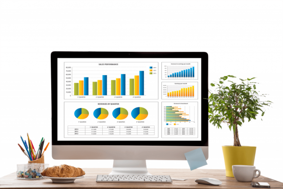 Financial Reporting Dashboard - Desktop monitor showing financial charts, sales performance, revenue by quarter, and balance sheet data